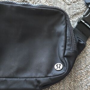 lululemon athletica Black Men's Sling Belt Bag with Silver Logo